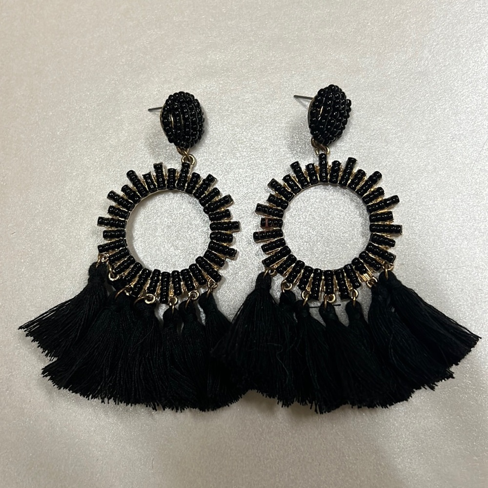 Black and gold earrings with tassels